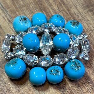 Unusual brooch with blue glass beads